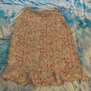 A skirt with flowers that give off a spring vibe.